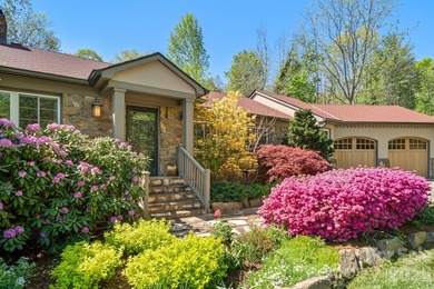 Tucked away among beautiful blooming perennials in Asheville's - photo 7