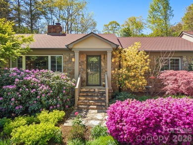 Tucked away among beautiful blooming perennials in Asheville's - photo 8