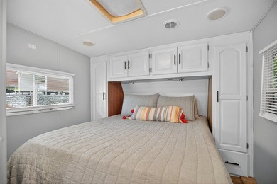 Check out this property! Super well kept RV with a large - photo 10