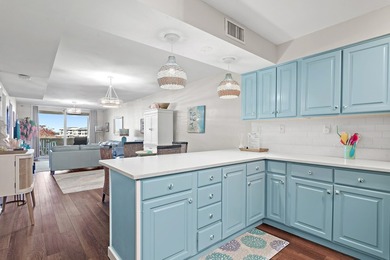 Jetty East is a Gulf front Gated 6-story midrise with under - photo 4