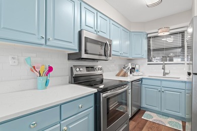 Jetty East is a Gulf front Gated 6-story midrise with under - photo 5