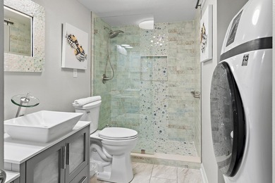 Jetty East is a Gulf front Gated 6-story midrise with under - photo 7
