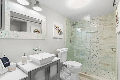 Jetty East is a Gulf front Gated 6-story midrise with under - photo 8