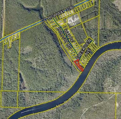 PEACEFUL WATERFRONT LOT CLOSE TO THE 331 BRIDGE! Located in one - photo 2