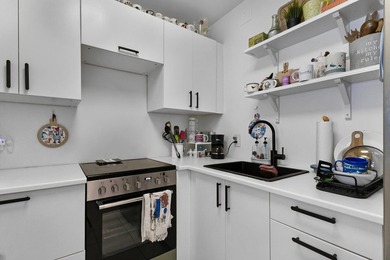 Spacious 1 bedroom, 1.5 bath second floor unit in the desirable - photo 13
