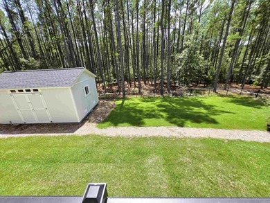 Strategically positioned for privacy, this beautiful home on the - photo 21