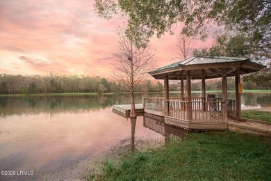 Tucked away on a quiet cul-de-sac in the gated community of Bull - photo 1