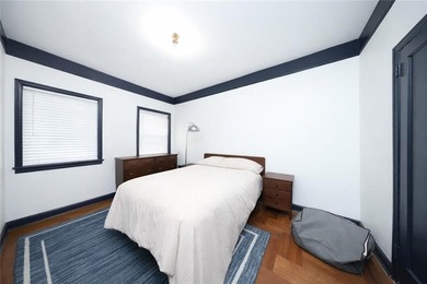 Welcome to this exceptional three-story, two-family brick home - photo 11