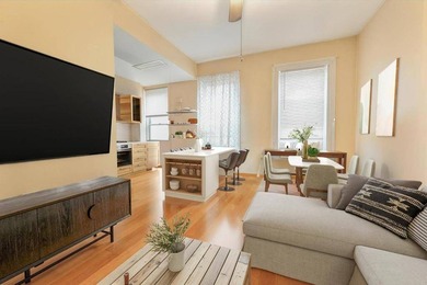 Discover this first-time offered solid brick townhome in the - photo 3