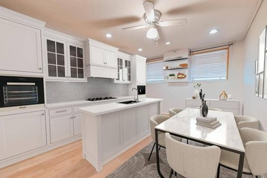 Discover this first-time offered solid brick townhome in the - photo 7