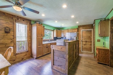 Set on nearly 2 private acres in Freedom, Maine, this unique - photo 14