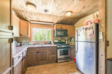 Set on nearly 2 private acres in Freedom, Maine, this unique - photo 30