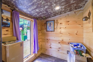 Set on nearly 2 private acres in Freedom, Maine, this unique - photo 32