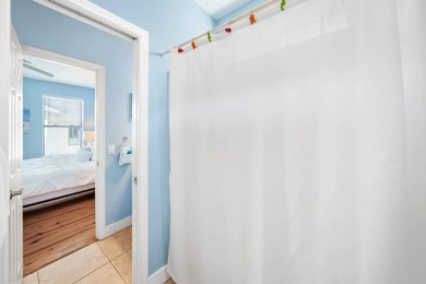 Located in the gated, Gulf-side community of Emerald Waters - photo 8