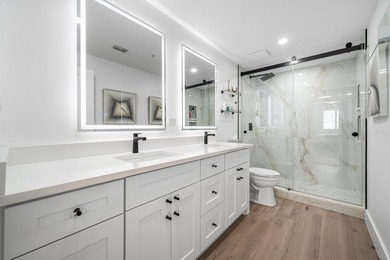 Absolutely stunning designer renovated condo in the heart of - photo 22