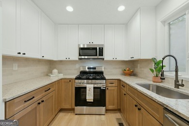Move-in ready and completely remodeled! This 3-bedroom, 2-bath - photo 8