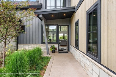 Nestled within the gates of the prestigious Aspen Glen Club - photo 5
