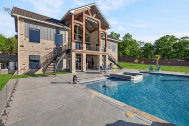 Resort style lake living at it's finest. Custom 5 bedrooms, 5 - photo 12