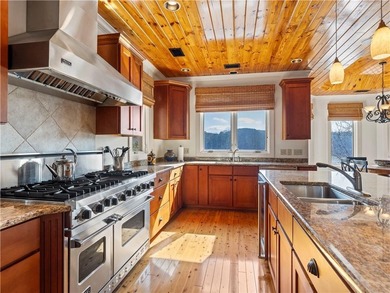 Experience unparalleled luxury in this custom-built lakefront - photo 20