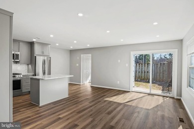 This beautifully renovated one level townhouse offers affordable - photo 4