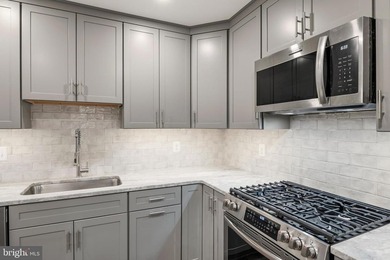 This beautifully renovated one level townhouse offers affordable - photo 9