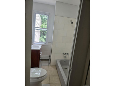 Welcome to this beautifully maintained attached one-family home - photo 11