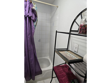 Welcome to this beautifully maintained attached one-family home - photo 12