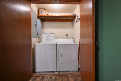 This quaint home sits in the perfect spot! Located just a short