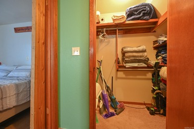 This quaint home sits in the perfect spot! Located just a short