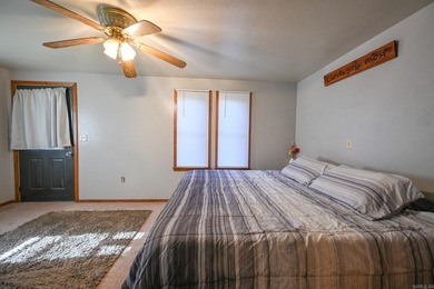 This quaint home sits in the perfect spot! Located just a short