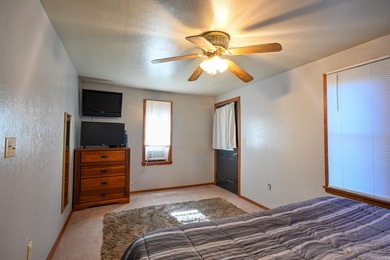 This quaint home sits in the perfect spot! Located just a short