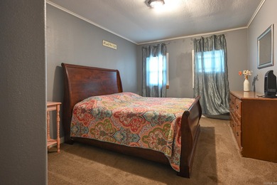 This quaint home sits in the perfect spot! Located just a short