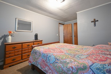 This quaint home sits in the perfect spot! Located just a short