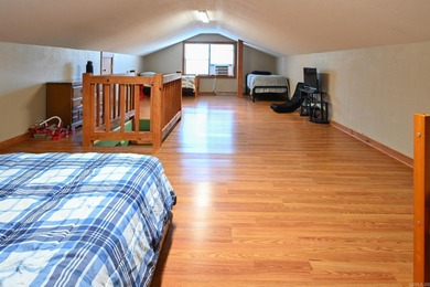 This quaint home sits in the perfect spot! Located just a short