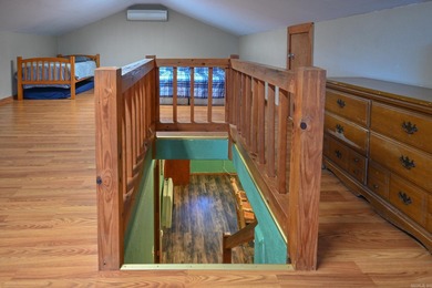 This quaint home sits in the perfect spot! Located just a short