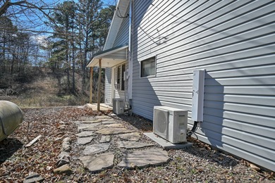 This quaint home sits in the perfect spot! Located just a short