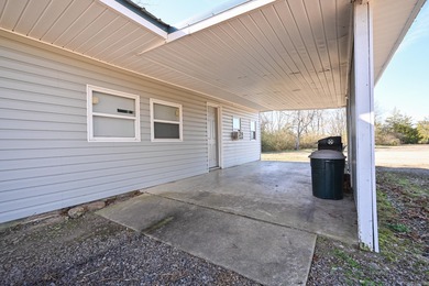 This quaint home sits in the perfect spot! Located just a short