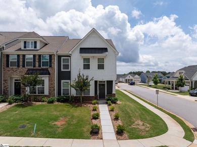 Built in 2023, this beautifully maintained end-unit townhome in - photo 1