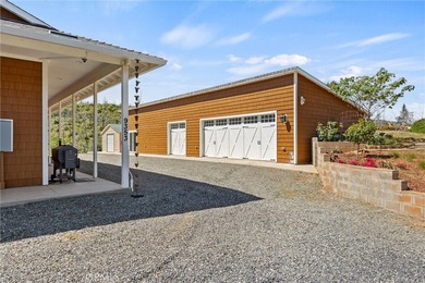 The large black iron electric gate is the gateway to your - photo 48