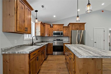 Discover easy living in this thoughtfully designed open-concept