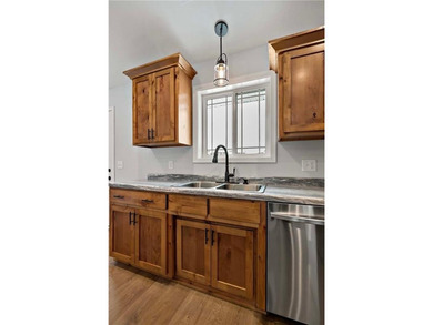 Discover easy living in this thoughtfully designed open-concept