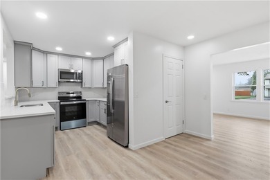 STILL AVAILABLE! Welcome to 23 Cross Gates! This fully renovated - photo 6