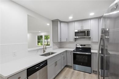 STILL AVAILABLE! Welcome to 23 Cross Gates! This fully renovated - photo 7