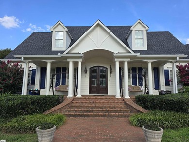 BRICK PAVERS lead you to an inviting FRONT PORCH. A dramatic - photo 1