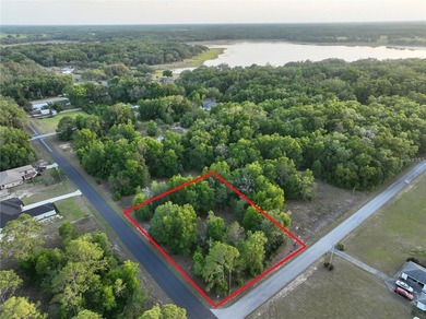 0.5 acres in the beautiful Rainbow Lakes Estates community - photo 1
