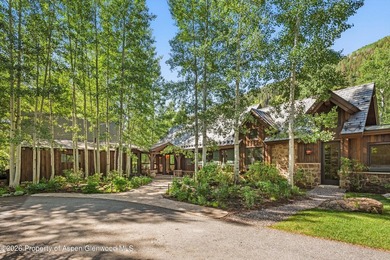This classic mountain-style home features four bedrooms, each - photo 2