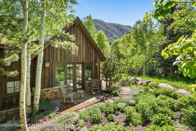 This classic mountain-style home features four bedrooms, each - photo 3