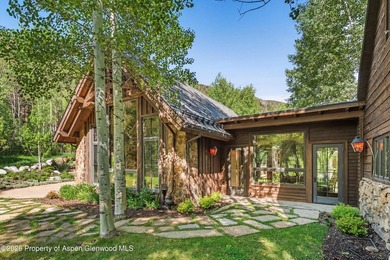 This classic mountain-style home features four bedrooms, each - photo 5