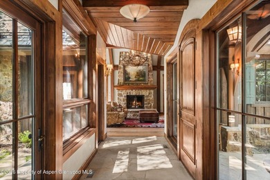 This classic mountain-style home features four bedrooms, each - photo 7