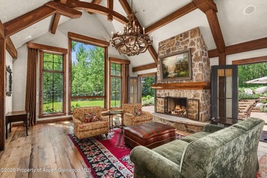 This classic mountain-style home features four bedrooms, each - photo 8